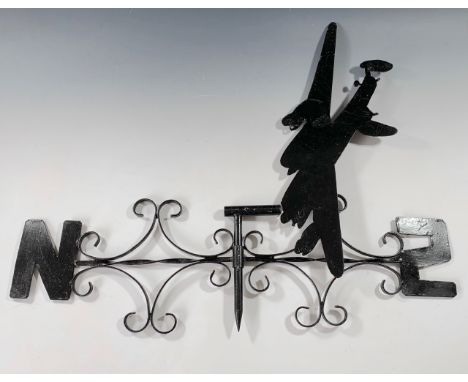 A wrought iron weather vane modelled as an RAF Lancaster bomber, 85 cm