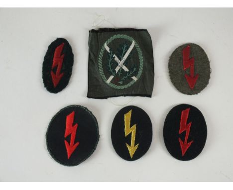 German Wehrmacht Heer (Army) BeVo breast eagle, subdued grey eagle against field grey backing; together with a group of Third