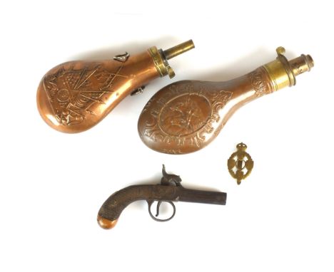 A small percussion pocket pistol, 19th century, with an octagonal barrel and chequered walnut grip with blank silver escutche