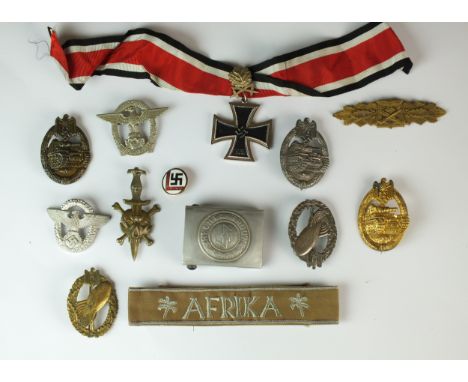 A group of thirteen reproduction and post-war German-style badges, medals and a buckle comprising a Knight's Cross; Recht en 