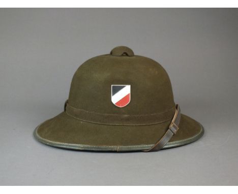 A Second World War German Army tropical pith helmet, 2nd pattern olive felt brimmed pith helmet with green leather trim and g