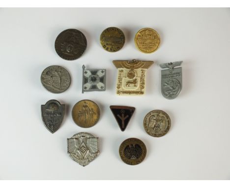 A collection of thirteen German Day Badges and tinnies comprising "Jugenfest 1937"; "Braunschweig Kriestag 1939"; "Obermoller