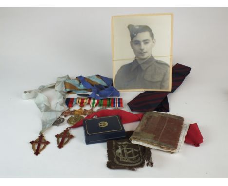 A group of five World War II medals comprising 1939-45 Star, Africa Star with 1st Army Clasp, Italy Star (replacements), Defe