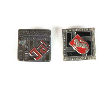 Two German square tinnies comprising a scare HEIMAT &amp; REICH MUNSTER 1933 (Home and Empire) badge with a black enamel swas