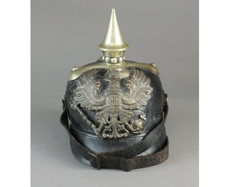 A Prussian Army service personnel black leather pickelhaube, 1860 pattern likely for an Assistant Paymaster / Zahlmeister-Ste