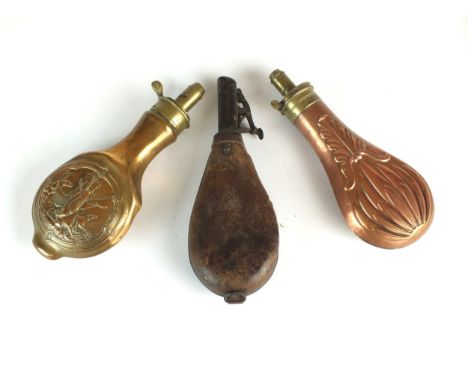 A group of three powder/shot flasks, 19th century comprising a copper and brass example by G &amp; J.W Hawksley, Sheffield, d