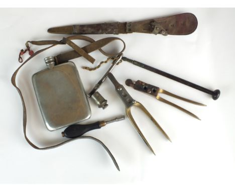 A collection of antique gunsmith tools including bullet moulds, nipple wrench, James Dixon gun oil bottle, Tranter's Patent t