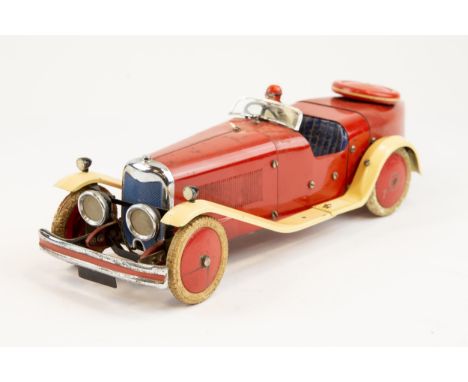 A rare 1930's No.2 Meccano Constructor Car. A boat tail example in red with cream mudguards/running boards, blue seat, red wh