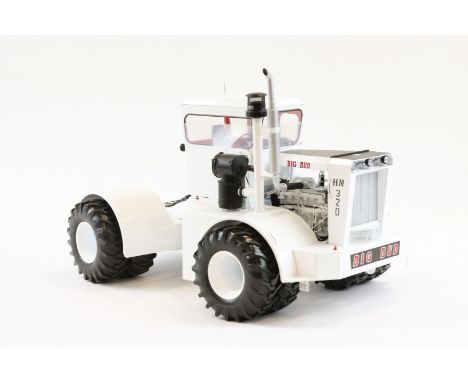 An impressively large 1:16 scale Universal Hobbies American BIG BUD HN320 heavy duty Tractor. Designed and built in Montana U