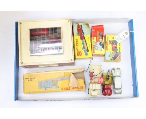 12 Dinky toys models. Lot includes Plastic fire station with 4 loose play worn  fire engines inside, figures and a few access