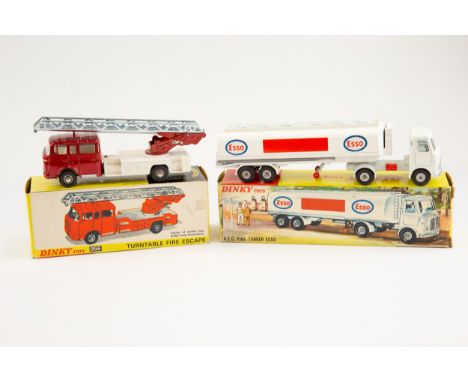 2 Dinky Toys. An A.E.C. Fuel Tanker ESSO (945). In white with red/ blue/white paper labels, an example with light grey plasti