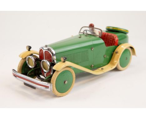 A rare 1930's No.2 Meccano Constructor Car. A short tail example in green with cream mudguards/running boards, red seat, gree