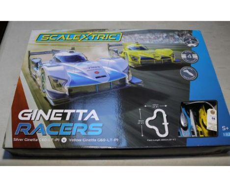 Scalextric Ginetta Racers 1:32 scale. Contains a silver Ginetta G60-LT-P1, and a yellow Ginetta G60-LT-P1. Set in brand new a