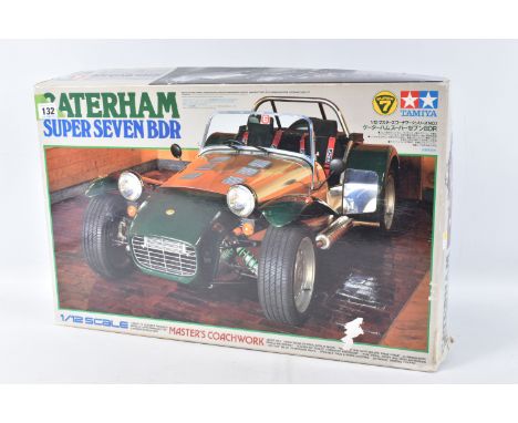 A BOXED UNBUILT TAMIYA CATERHAM SUPER SEVEN BDR 1:12 SCALE MODEL VEHICLE, numbered 10201 19800, model looks to have been star