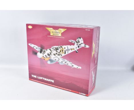 A BOXED CORGI WORLD WAR II MESSERSCHMITT BF109G-2 'THE LUFTWAFFE' 1:32 SCALE MODEL AIRCRAFT, painted in light grey and black 