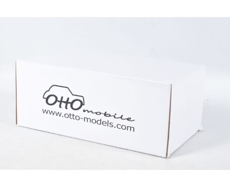 A BOXED OTTO MOBILE FORD RS200 GRP B LOMBARD RAC 1:18 MODEL RALLY CAR, numbered OT679 UV1, white and blue painted with sponso