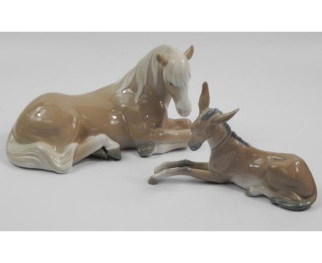 Two Lladro porcelain animals, a recumbent horse (AF), and a similar donkey. 