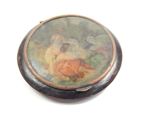 A 19thC tortoiseshell patch box, the circular mirrored top set with figures at rest, with a plain interior, 7cm dia.