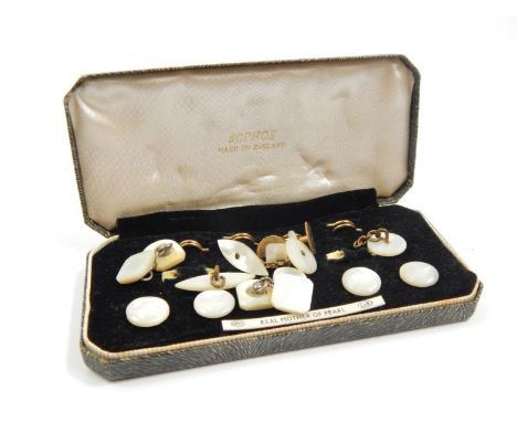 An early 20thC mother of pearl collar and tie pin set, to include cuff links, etc, in a fitted case, 13cm wide.