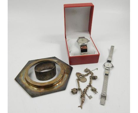 Various silver and jewellery, comprising of a Rostini his and her watch set, part charm bracelet, napkin ring 5cm wide, and a