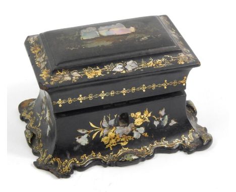 A Victorian papier mache ink box, with gilt and mother of pearl decoration and scrolling base, 16cm wide, (AF).
