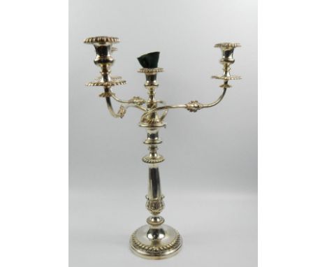 A fine Edwardian electroplated candelabrum, in George III style, with detachable three branch four light insert, with gadroon