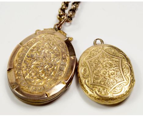 Two late 19thC/early 20thC lockets, one unmarked and containing a portrait of a lady within an elaborately engraved outer cas