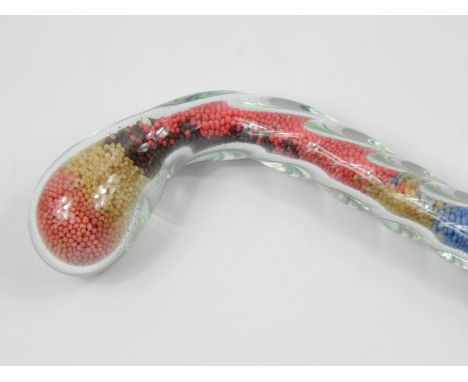 A Victorian style Wrythen glass walking stick, containing a number of coloured beads in stripe design, 208cm long.