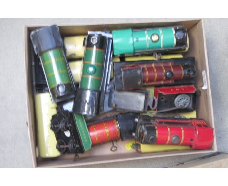 Playworn clockwork locomotives by Hornby, Mettoy and Chad Valley, and nine small passenger coaches, F (Est. plus 21% premium 
