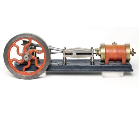 A live steam model of mill type engine, 2 1/2" bore, 4" stroke, 9" fly wheel, 24" x 6", non-reversing on cast base, F (Est. p