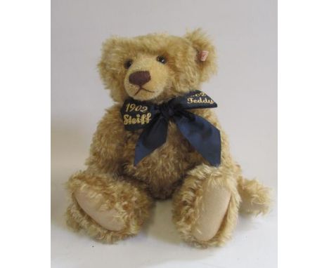 A "1902" Steiff teddy bear with long curly beige plush, with original box and certificate No.006979, dated 2002 (Est. plus 21