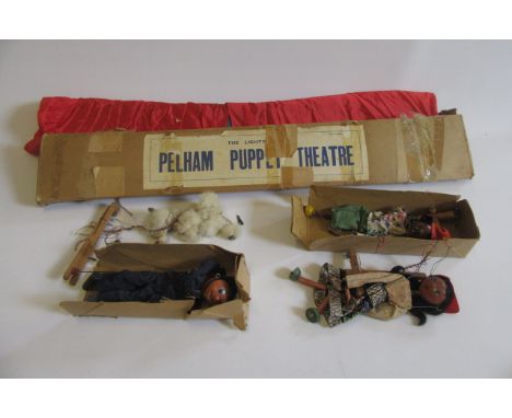 A Pelham Puppet Theatre, box AF, and four Pelham puppets comprising Sailor, Dutch Girl, Policeman and Poodle, with two boxes 