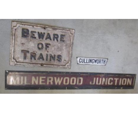 A Cullingworth gas lamp name plate, glass, black on white, 14" x 2 3/4", a signal box sign "MILNERWOOD JUNCTION", enamelled m