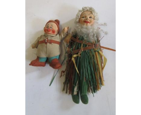 A Norah Wellings felt covered doll "Mrs Neptune" with trident, grass dress and Line Crossing label inscribed 1934, a Chad Val