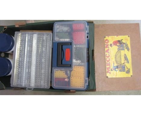 A quantity of Meccano parts, mainly in red, green, yellow and silver, some contained in scratch build wood cases (Est. plus 2