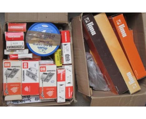 Fleischmann track accessories including point switches and uncoupling track, and eight Lima goods trucks and coach, most item