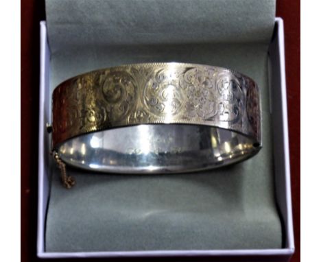 A silver bracelet with 9ct Gold front plate and chain, marked H.G&amp;S. Inscribed R-J 29.4.38