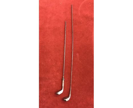 A pair of silver plate golf club hat pins dated 1910-1920's