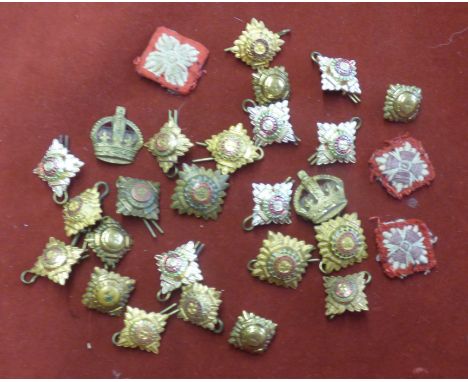 British WWII and Later mixed collection of Rank pip devices (28) many gilt and enamel, some cloth and (6) staybright pips. So