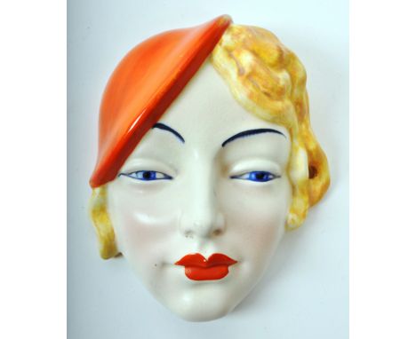 Beswick - A mid-century ceramic wall hanging figure, depicting a girl in a beret, numbered '197', with a hole in the back for