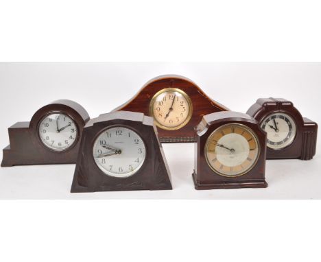 A collection of five vintage 20th century mantel clocks, including an Edwardian mahogany inlaid clock, a Smith Sectric bakeli