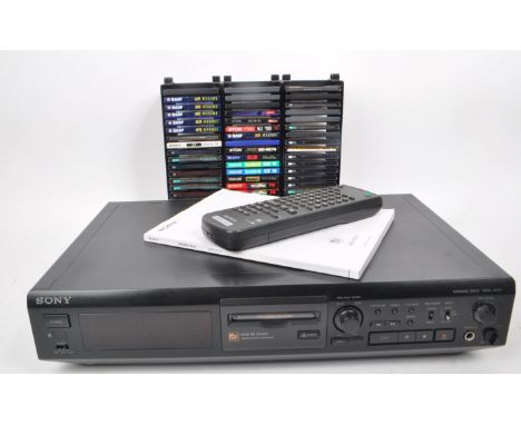 SONY - A 1997/01 vintage minidisc deck player, MDS-JE510 and the remote control, with an additional collection of mostly reco