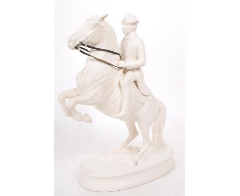 A vintage 20th century white porcelain man riding a horse figure, featuring attached leather straps for the reins. Horse is i