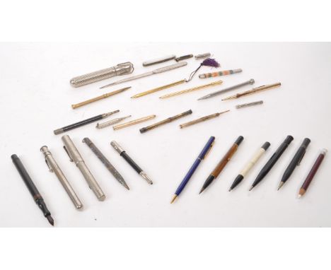 Collection of vintage 20th century pens, propelling pencils, pen knife, letter opener, cigar case and more. With examples fro