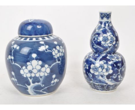 Two early 20th century Chinese porcelain blue &amp; white prunus ginger jar and vase. One example is double gourd tapering va