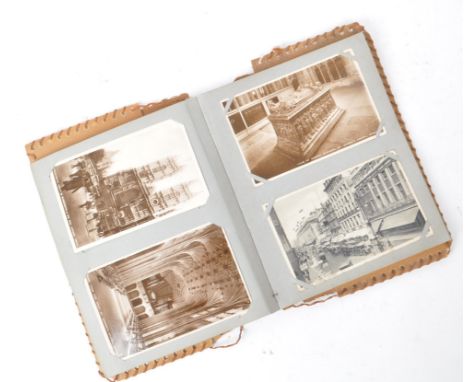 A collection of vintage 20th century black and white postcards, presented in an album. Subjects including national locations,