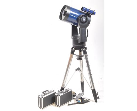 1999 Meade LX90 Schmidt-Cassegrain telescope, tripod, and accessories. Featuring a 203mm diameter and 2000 focus, serial no. 