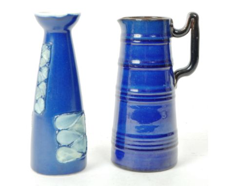 Two vintage 20th-century studio pottery vases / jug, comprised of a Torquay blue glazed, single handled, slightly coned jug /