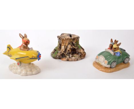Royal Doulton - Three 20th / 21st century figures, comprising of a 2002 ceramic 'Chocs Away Bunnykins' figure DB 267 no. 249 