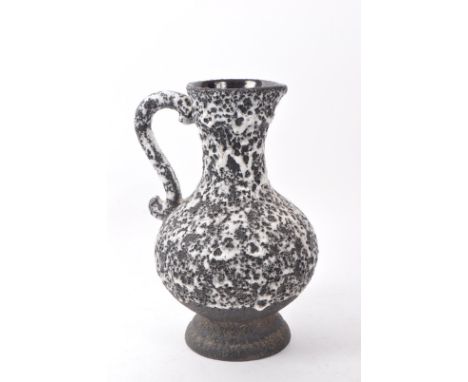 Jopeko - A vintage mid 20th century Jopeko West German fat lava style glaze ceramic jug / vase. The jug having black ground w